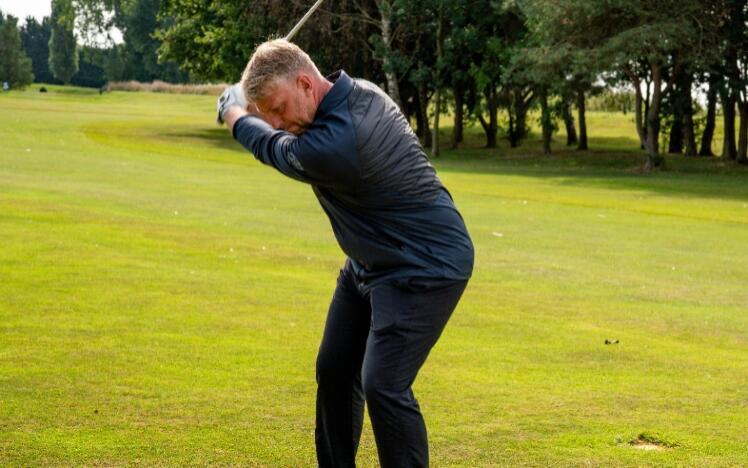 Golfer taking a swing