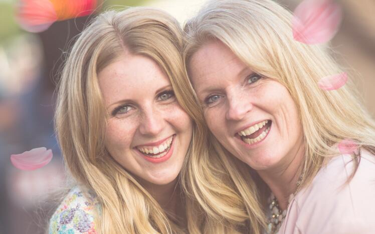 Mother and daughter enjoy a day at the races