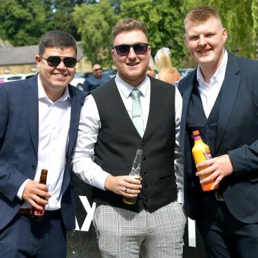 A group of young men at the races