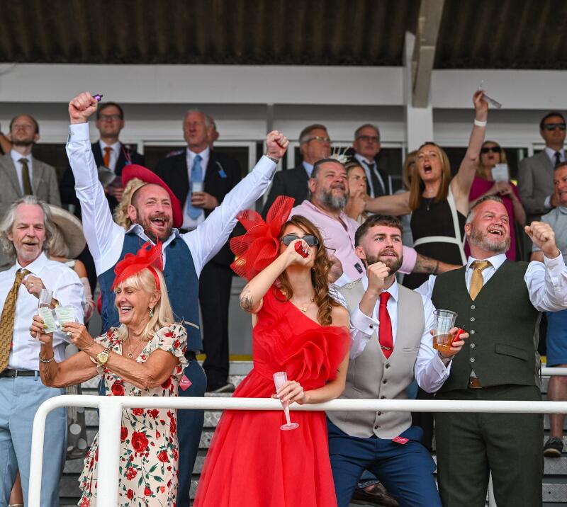 Some of the grandstand at Southwell celebrating a win at the races