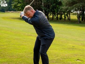 Golfer taking a swing